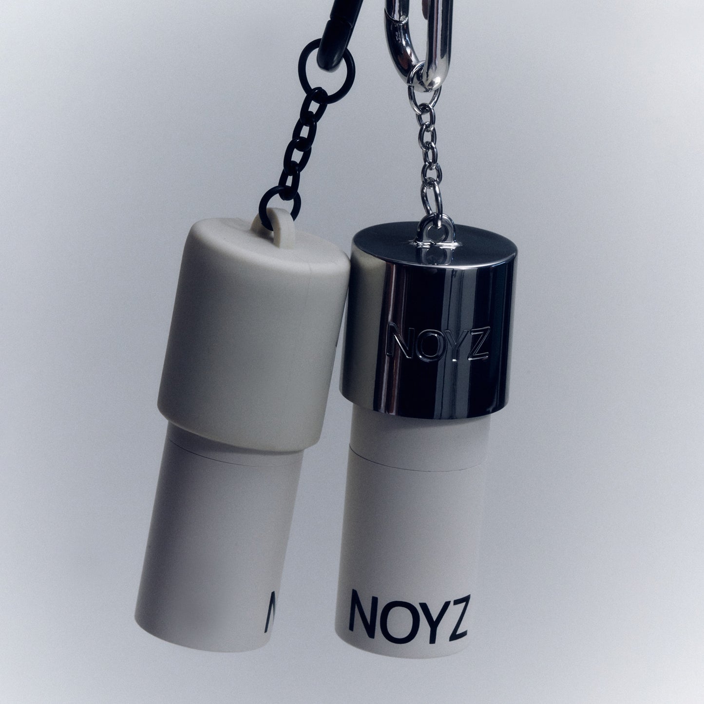 UNMUTE SOLID + CHROME BAG CHARM