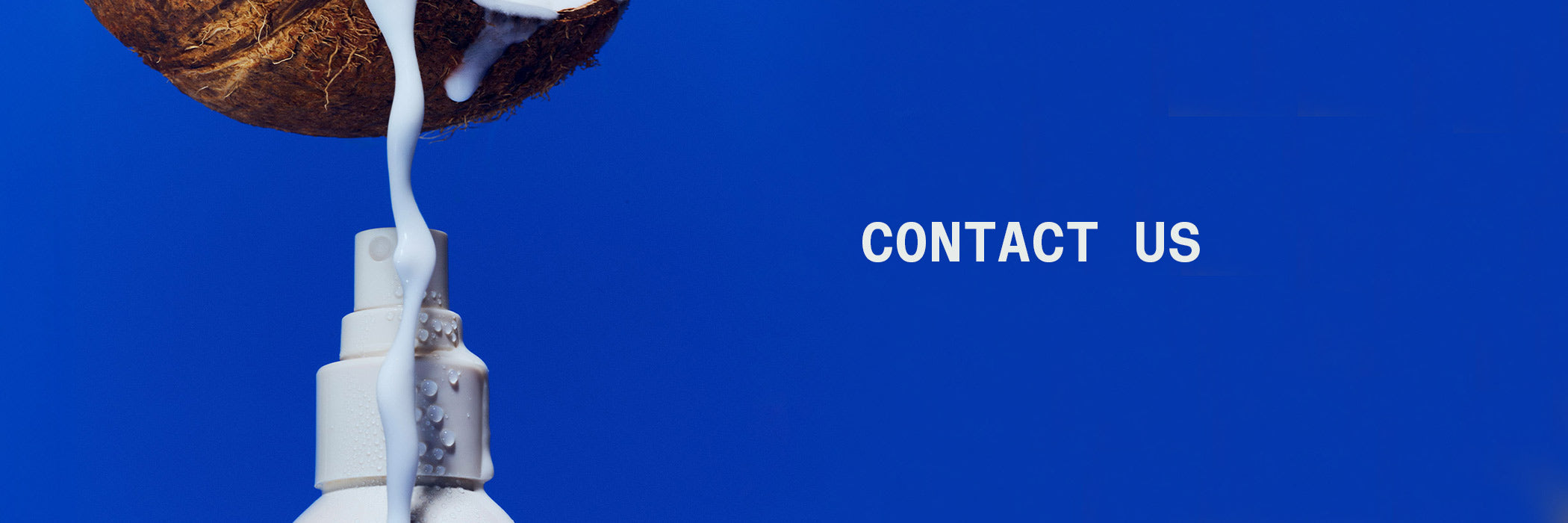 Coconut with white liquid dripping from it against a blue background with 'CONTACT US' text.